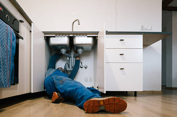 Professional Emergency Plumber technician working in Rockport, MA